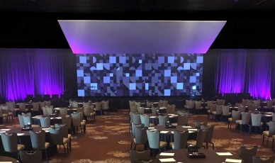 White Seamless AV-Drop Modular backdrop hung as ceiling for corporate stage event
