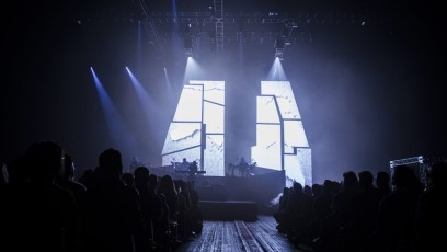 Custom Angle AV-Drop Modular backdrop set hung from venue rig for tour show