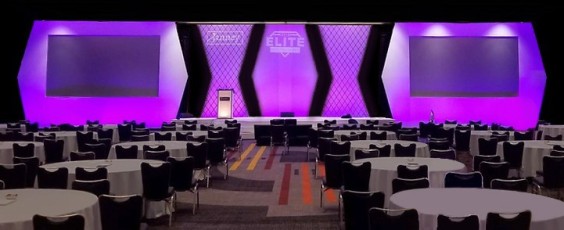 Dual Screen Av-Drop Modular Backdrop for Corporate Stage event designed as angles with ELITE graphic center