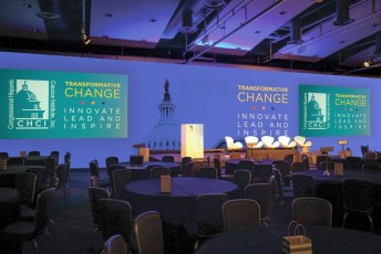 Seamless graphic print AV-Drop modular backdrop with dual screens printed in for corporate event