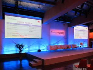 Dual Screen AV-Drop Modular Backdrop with graphic print center and screens set above set for corporate event